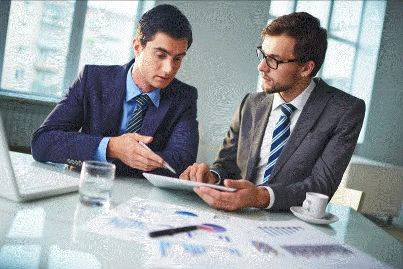 two men working at office